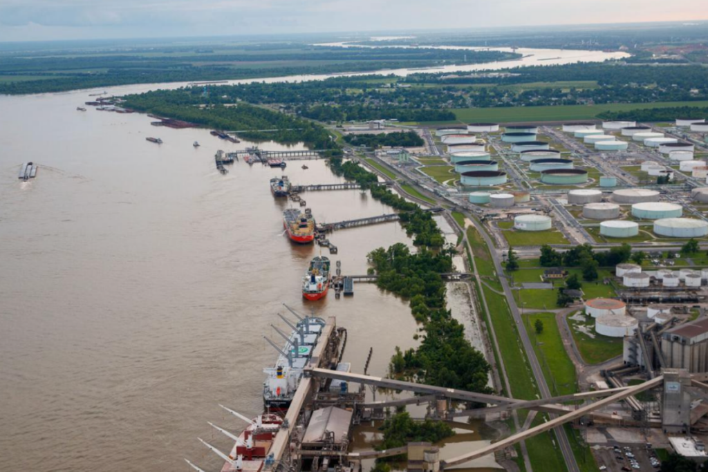 Commercial river traffic and industrial waterfront infrastructure in New Orleans, Louisiana